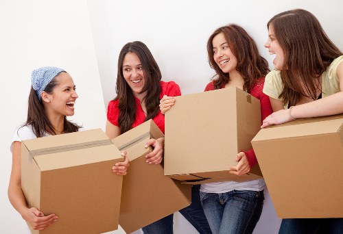 Packed moving boxes ready for collection from a Hampstead property