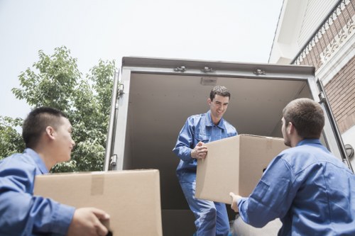 Furniture and boxes being loaded into a van in Hampstead