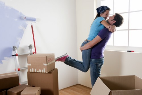 Loading furniture into a moving van in Hampstead