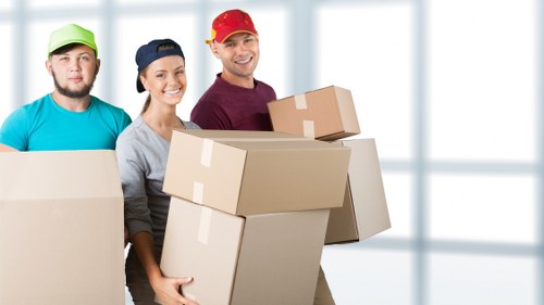 Business relocation team transporting office assets in Hampstead