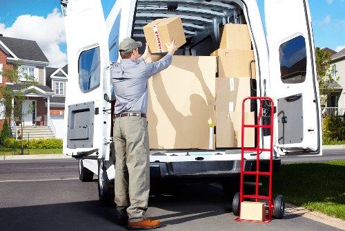 Team protecting property while moving furniture