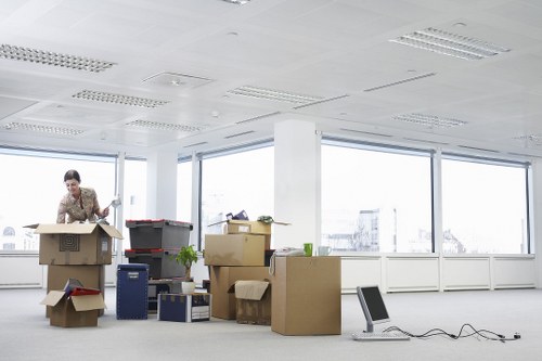 Professional movers handling office furniture in Hampstead