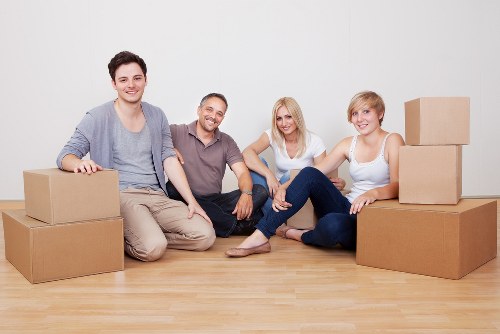 Boxes and furniture being moved in a Hampstead apartment building