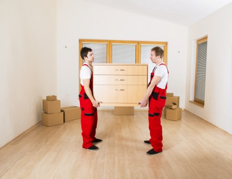 Moving crew navigating a period property in Hampstead